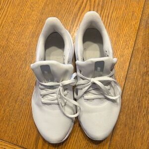 White Nike tennis shoes